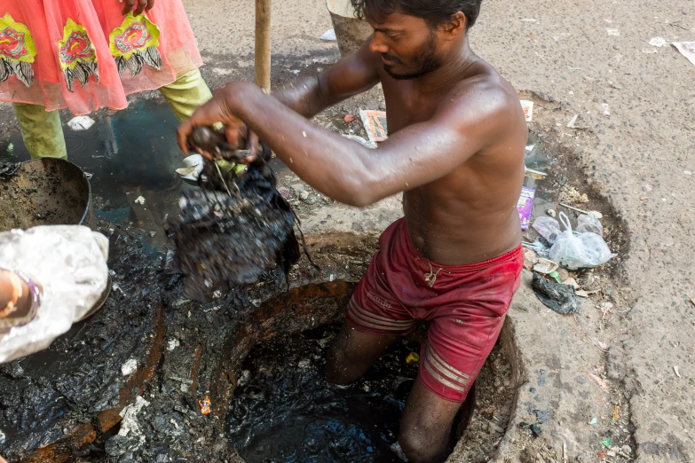 a young man cooking on the open grill