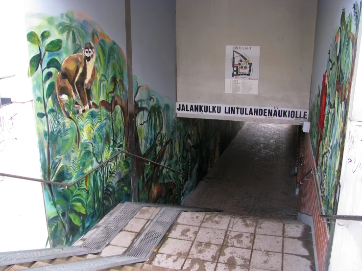 an alleyway painted with colorful wall art