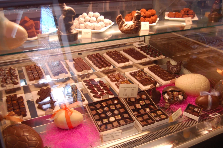 a display case that has some kind of chocolate dessert