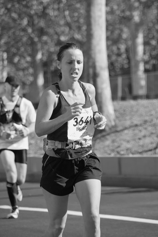 black and white pograph of a runner running