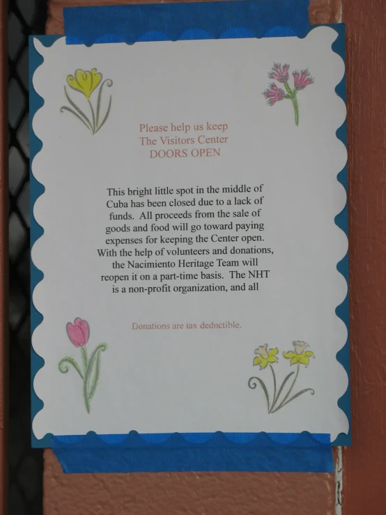 an image of a plaque with flowers on it