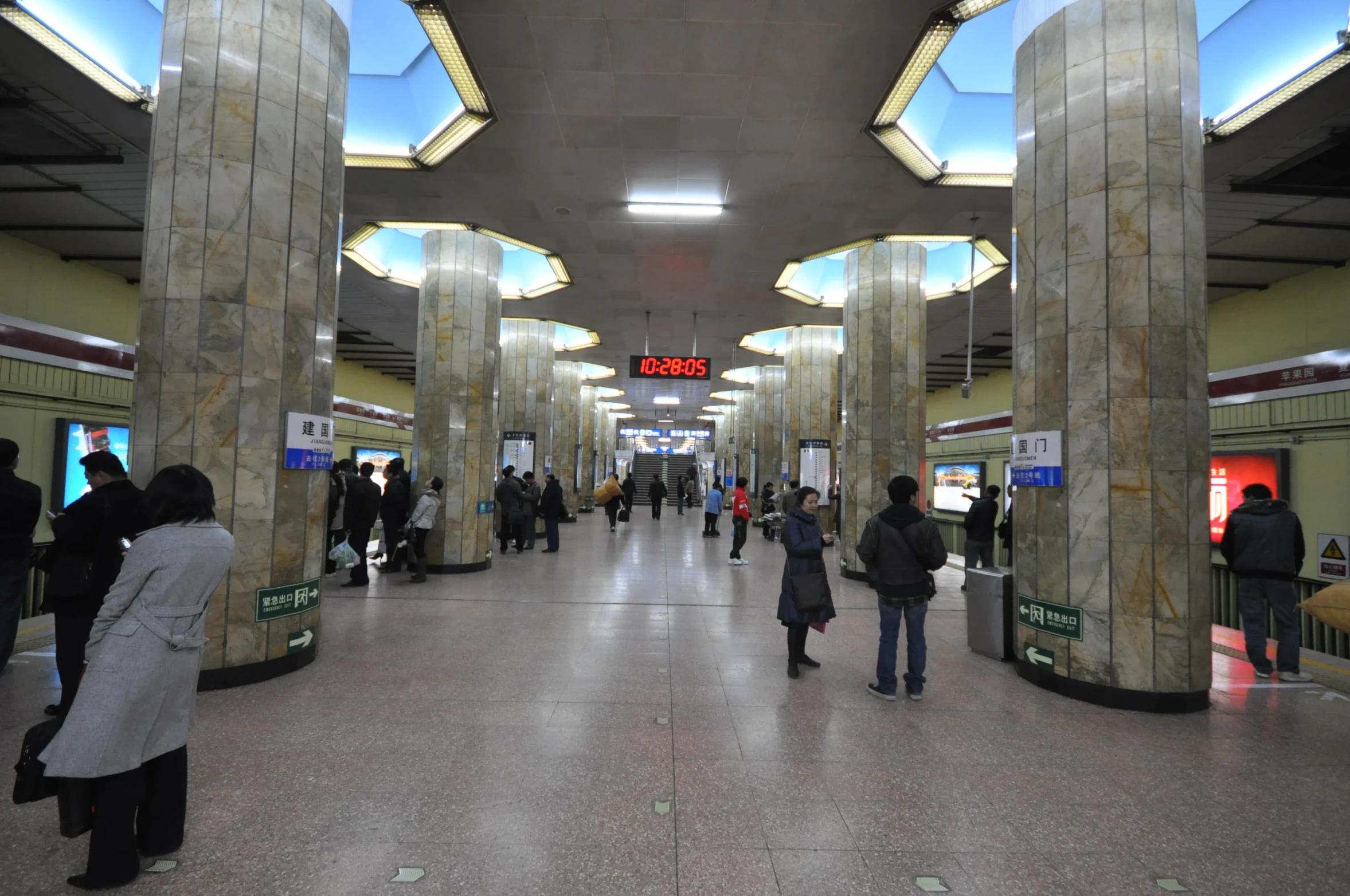 people at the entrance to the subway station