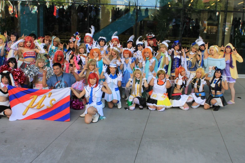 the group of people in costume are posing together