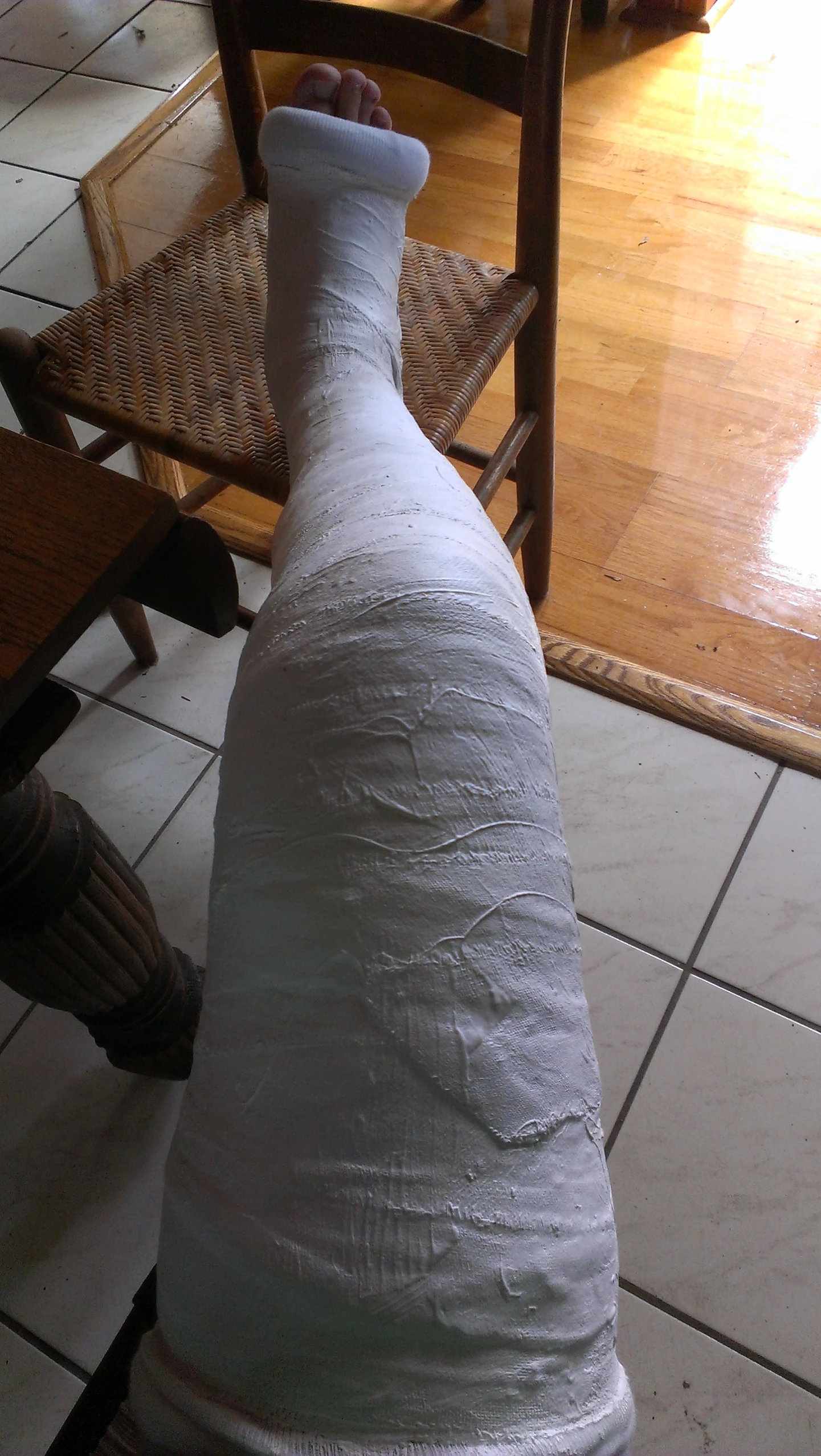 a roll of white cloth sitting on top of a table