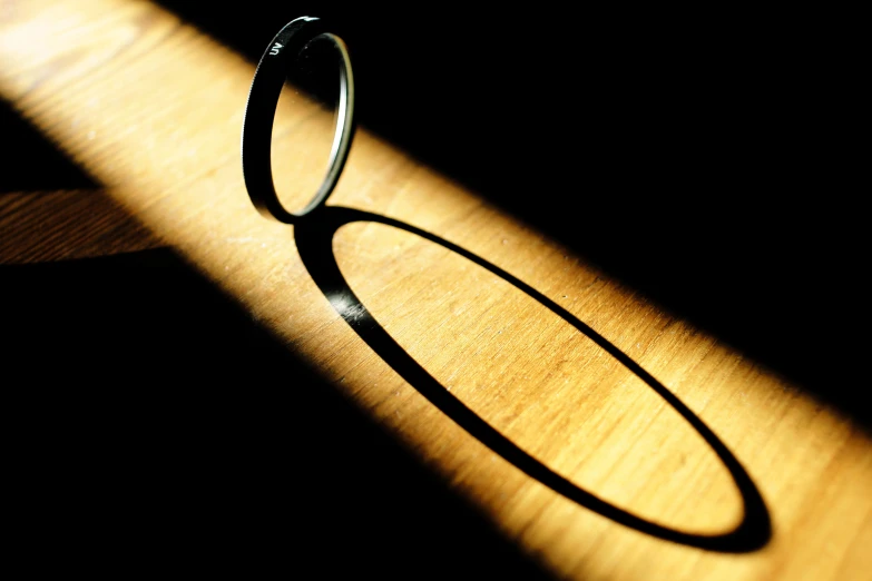 an image of a sunbeam shining down on a wood floor