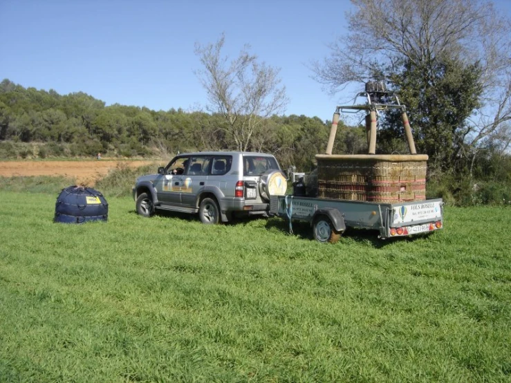 two trucks parked in front of a monument