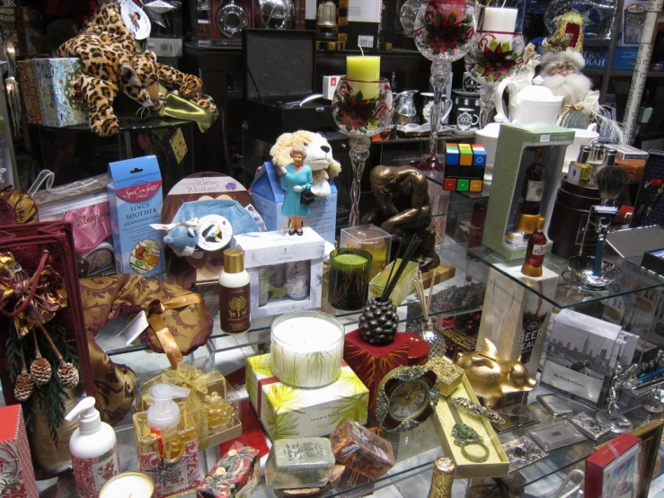 a small shelf filled with assorted items at a store