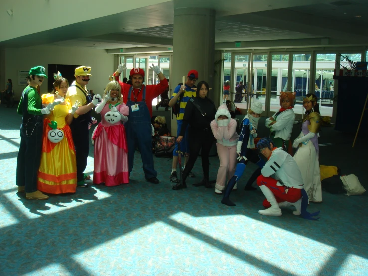 people standing around in costume wearing some like characters