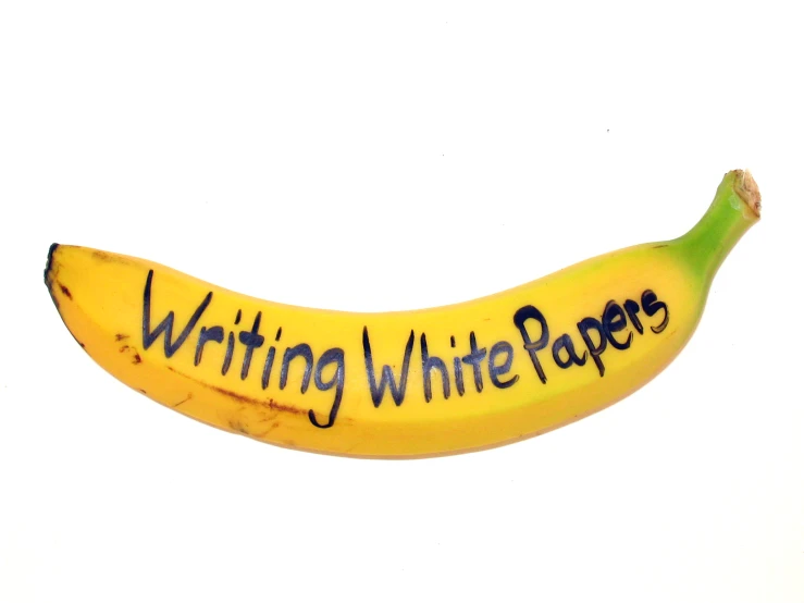 a yellow banana with writing on it that says'white paper '