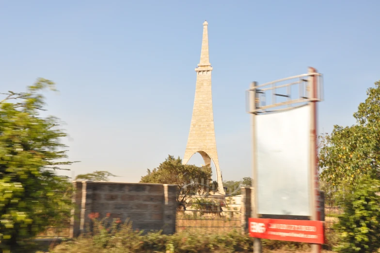 view of a tower with a flag outside it