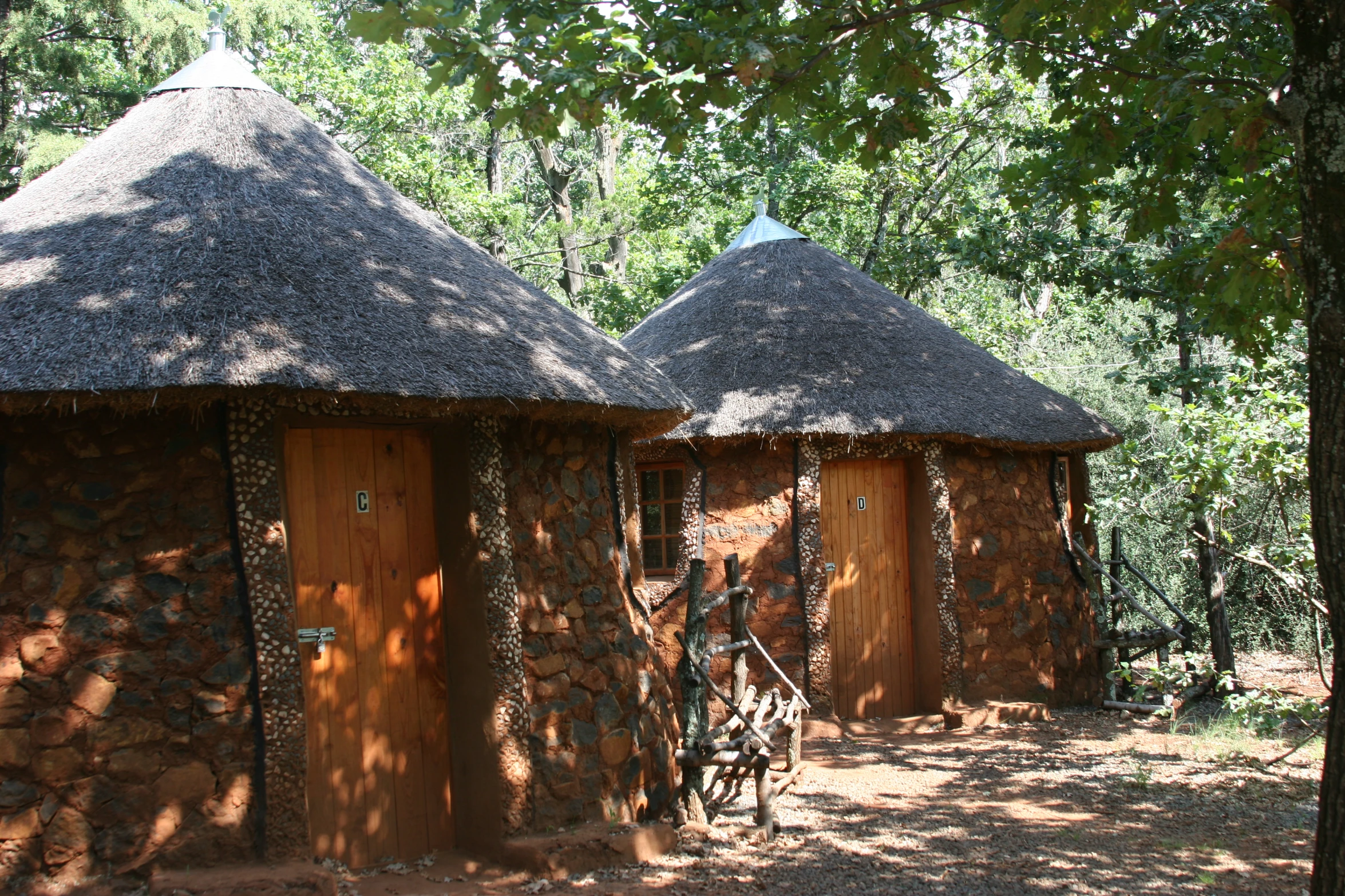 the huts are made out of rocks and stone