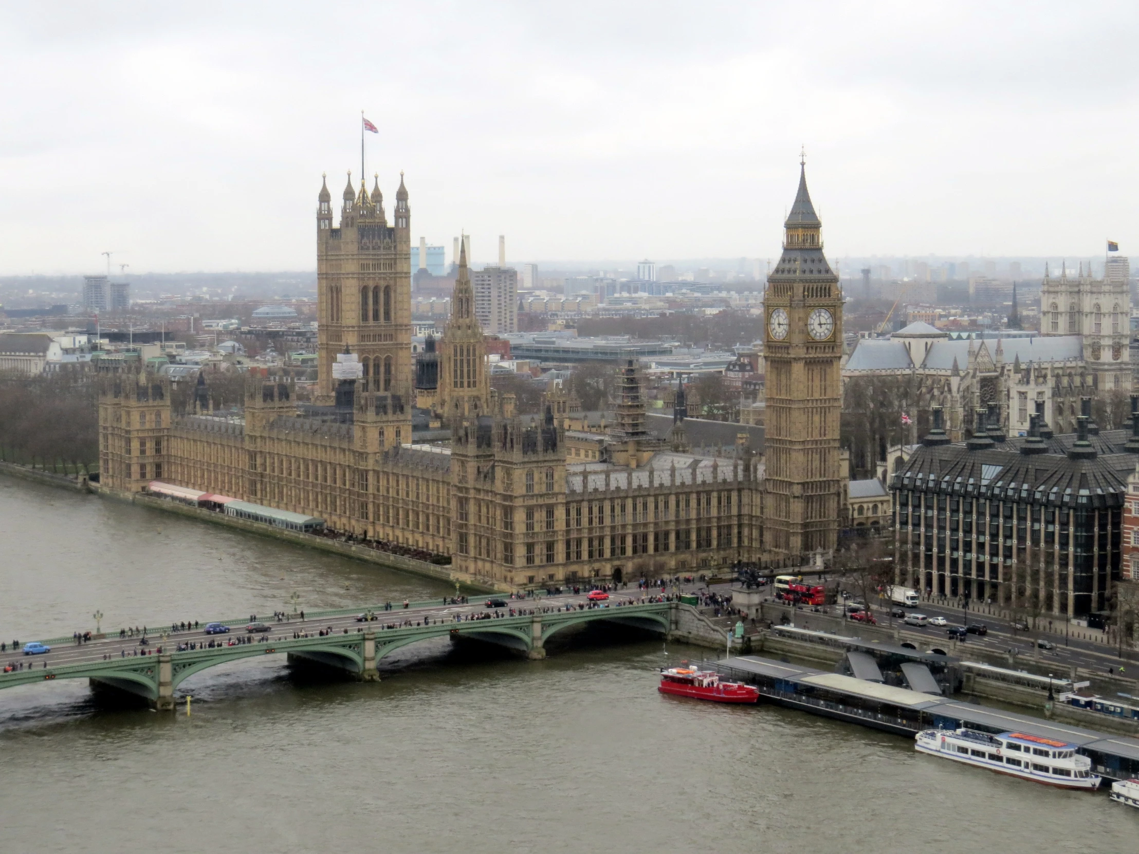 big ben and parliament along the river thames in london