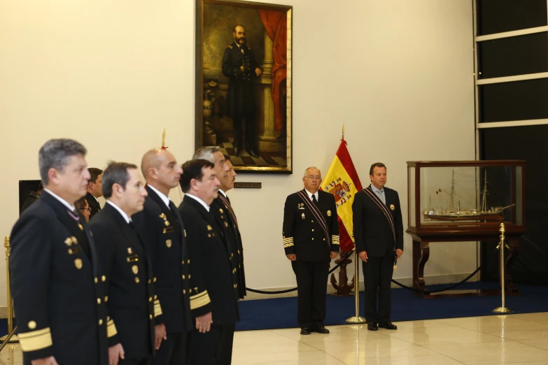 military officers and men are standing near each other