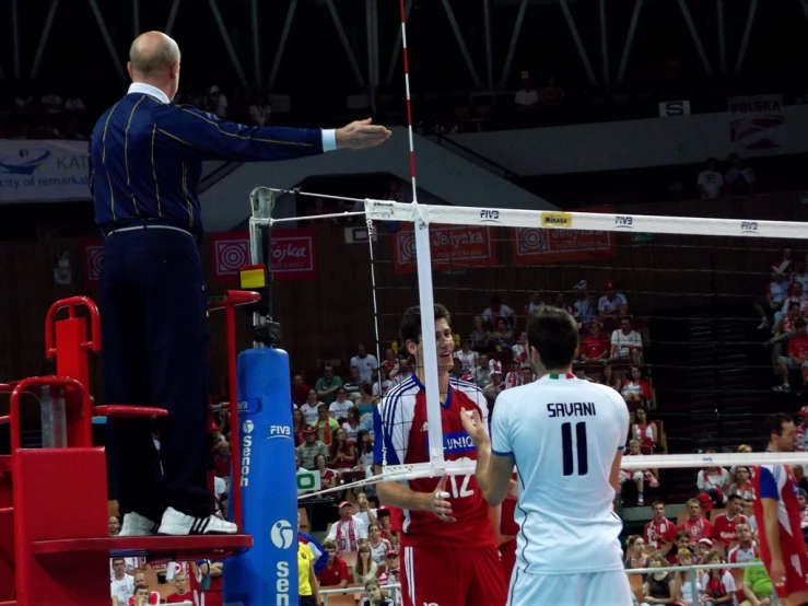 the player has just hit the ball on the volleyball court