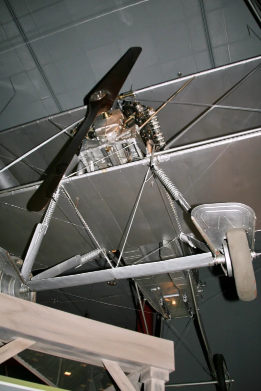 a close - up of a metal structure with some black pieces on it