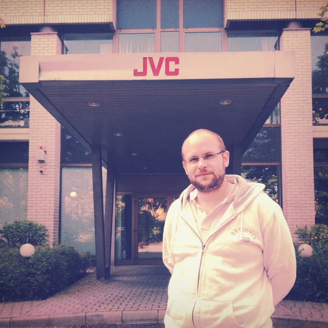 a person standing in front of a building