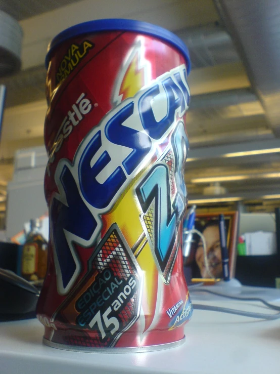 a can of mountain dew is sitting on top of the desk