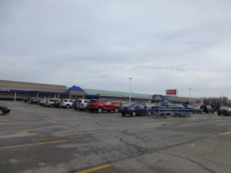 a large group of cars parked in a lot