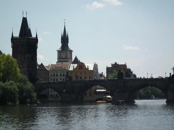 the bridge and buildings are next to each other