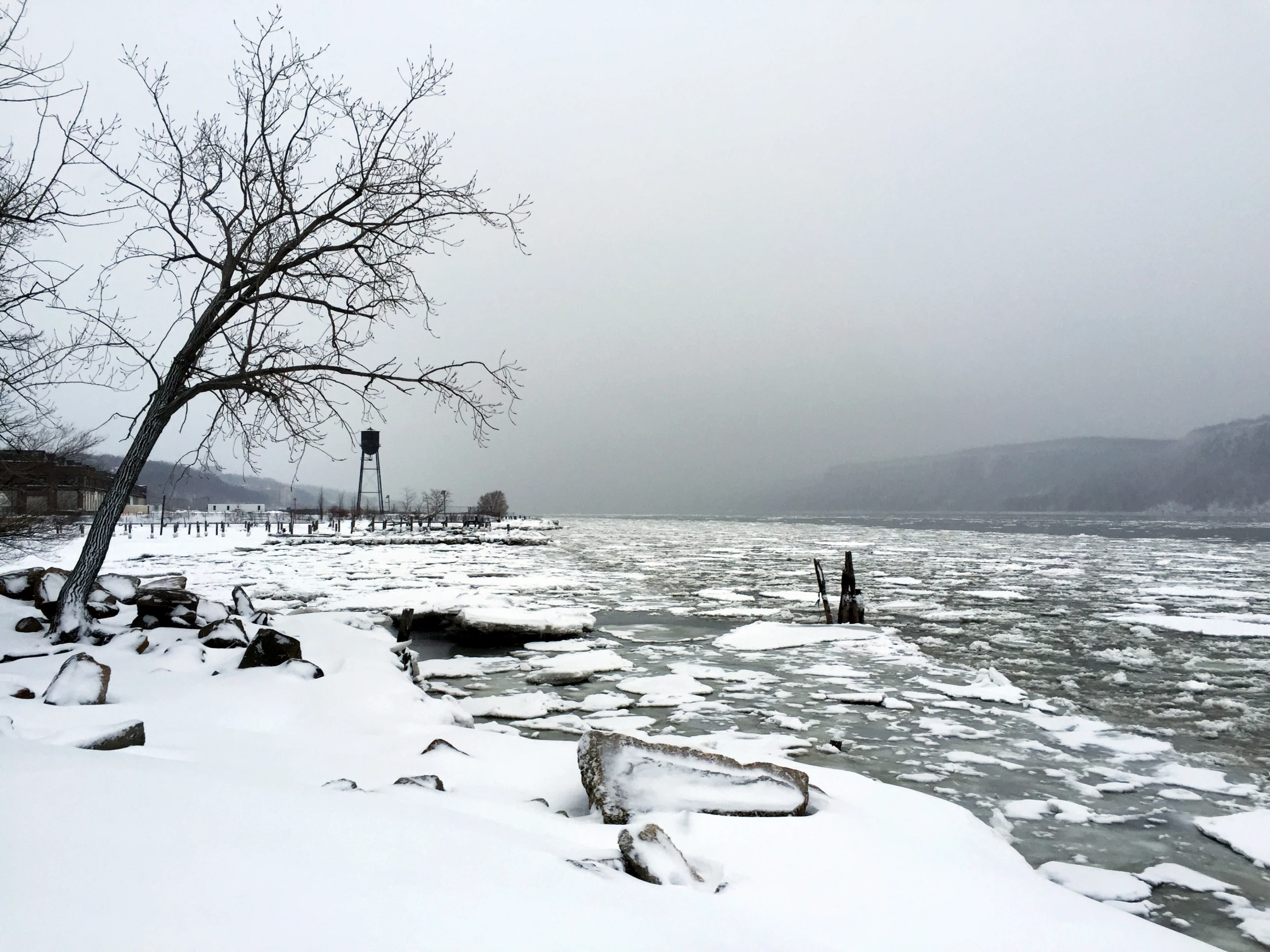 a body of water that is partially frozen