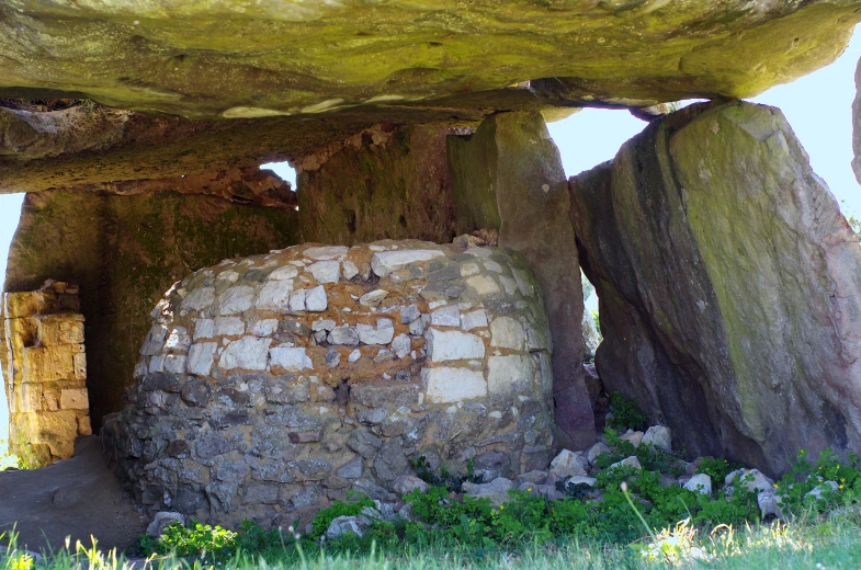 the ruins of several structures and very large rocks