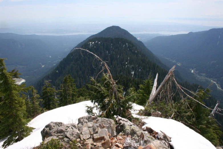 a mountain in the distance has snow on it