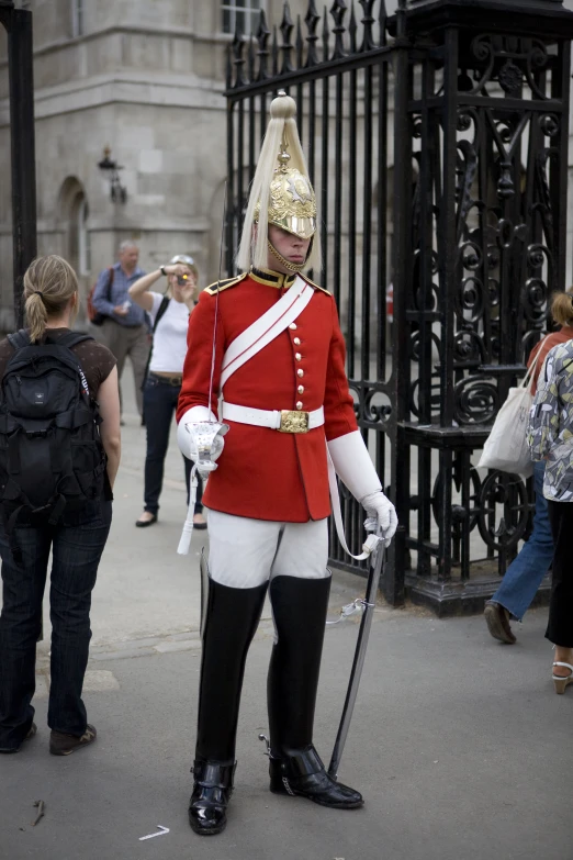 a man dressed as a soldier standing outside