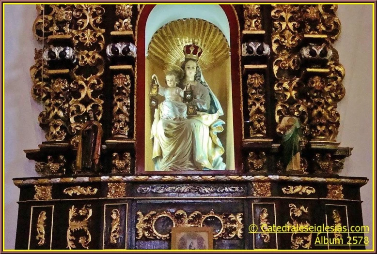 the image of lady mary and jesus above a mantle on display