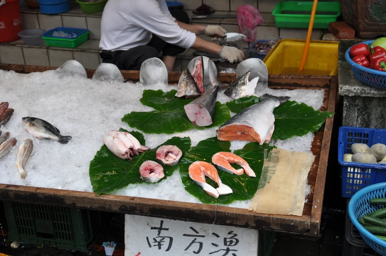 several types of seafood are displayed on a table