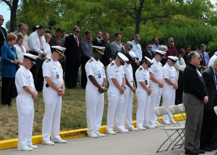 military ceremony in progress with officers in uniforms