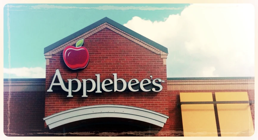 a storefront with an apple on it