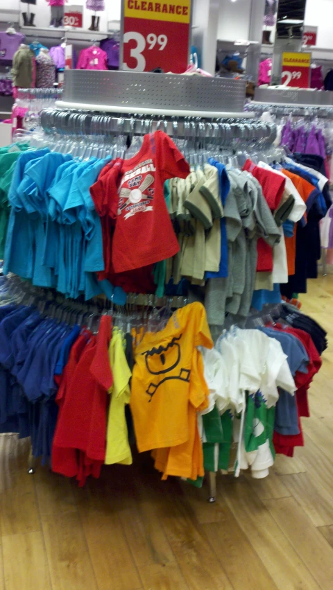 a display in the grocery department filled with lots of clothes