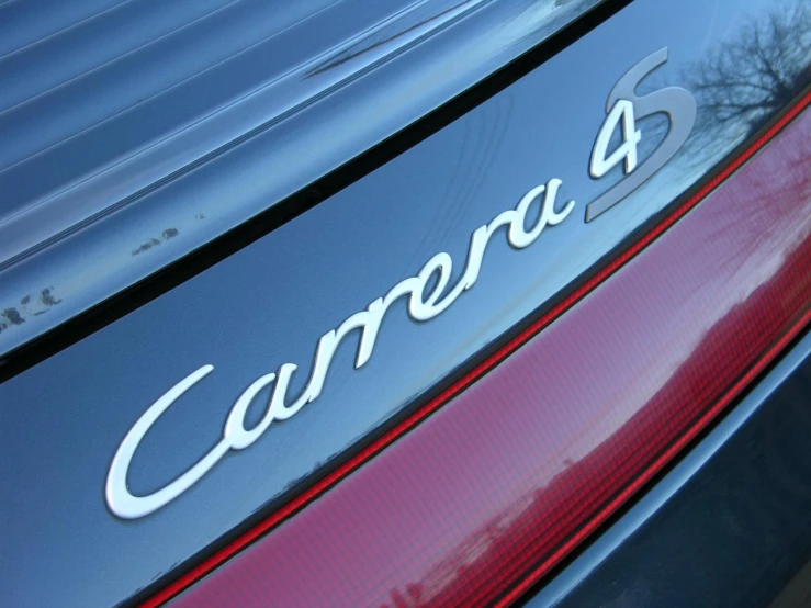 the name of a car is shown on the side of the vehicle