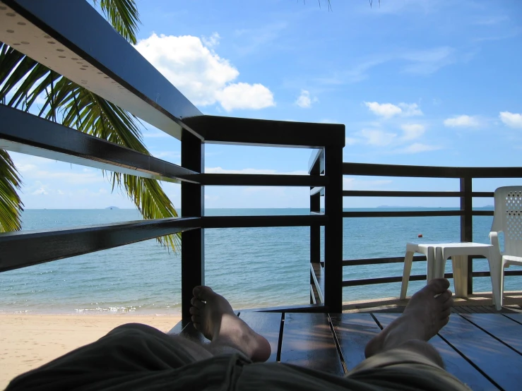 view from the deck of a wooden beach house