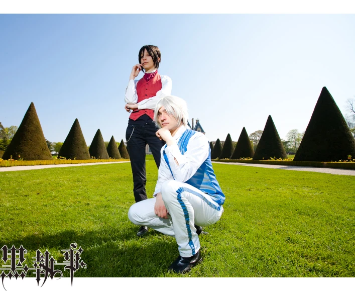 two women in costumes are posing for a po