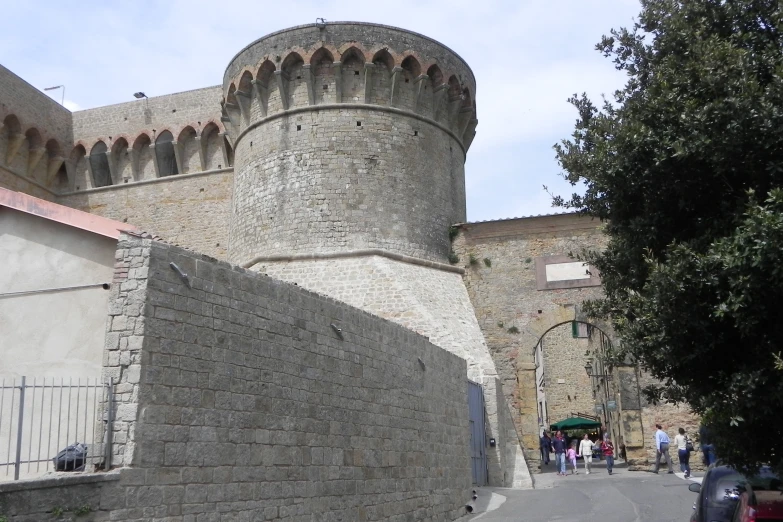 this building has a large tower near the entrance