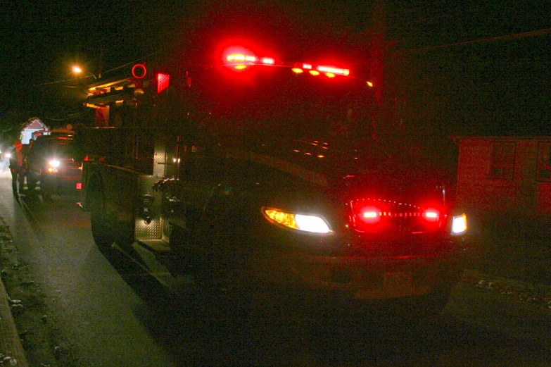 vehicles driving on the road at night time