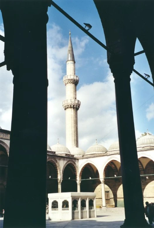 an ancient mosque in middle of a city