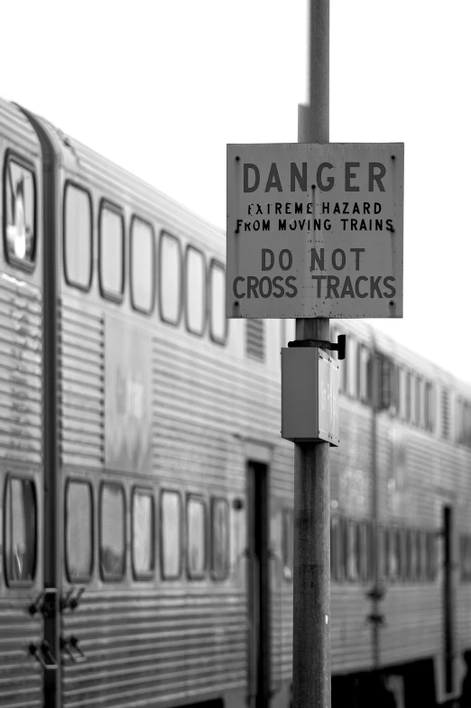 black and white picture of a train, possibly danger