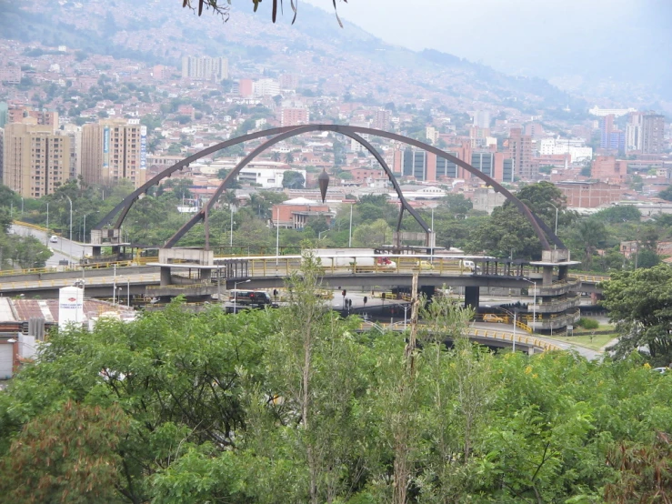 a train station is next to a bridge