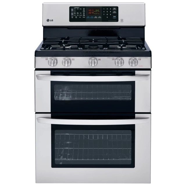 two silver double ovens side by side with the same
