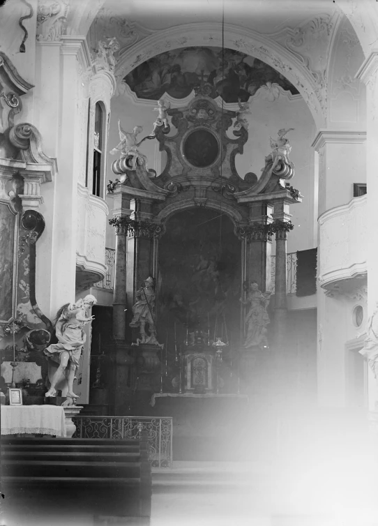 a large ornate altar with two statues