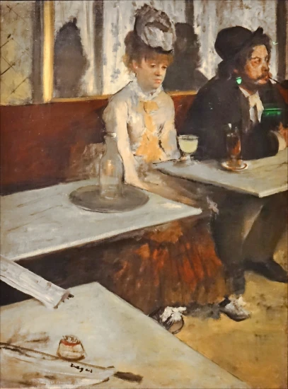 two people sitting at tables near each other