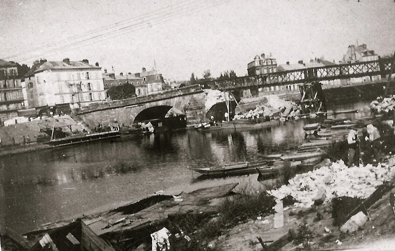 old pograph of an old bridge in a city