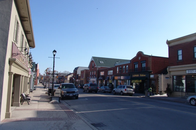 a row of buildings on a small city street