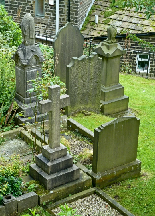 a graveyard with many headstones in it
