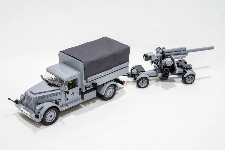 the large toy truck with cannon is ready to go