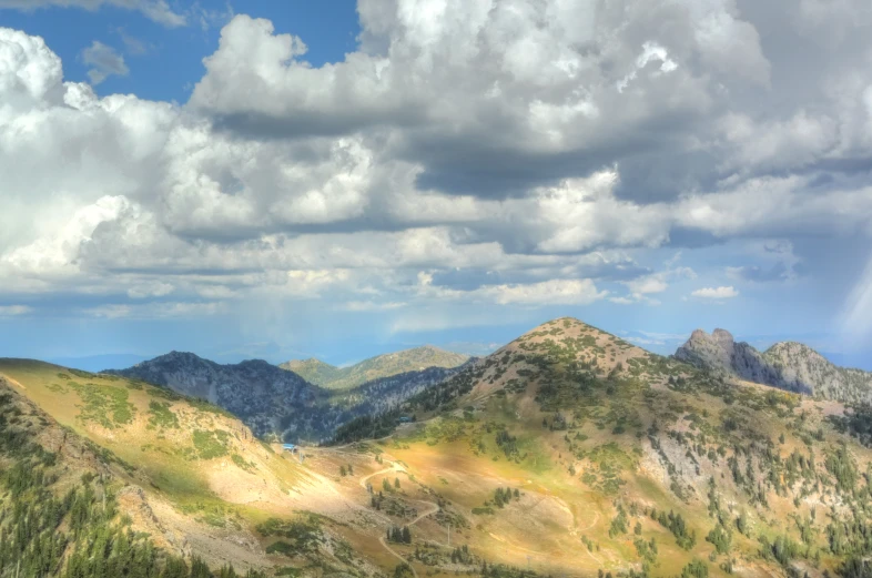 the mountains are green and brown in color