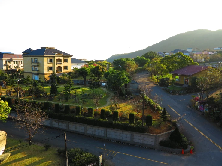 a scenic area near some houses with some trees