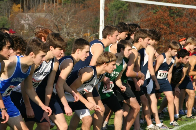 many boys are lined up to start the race